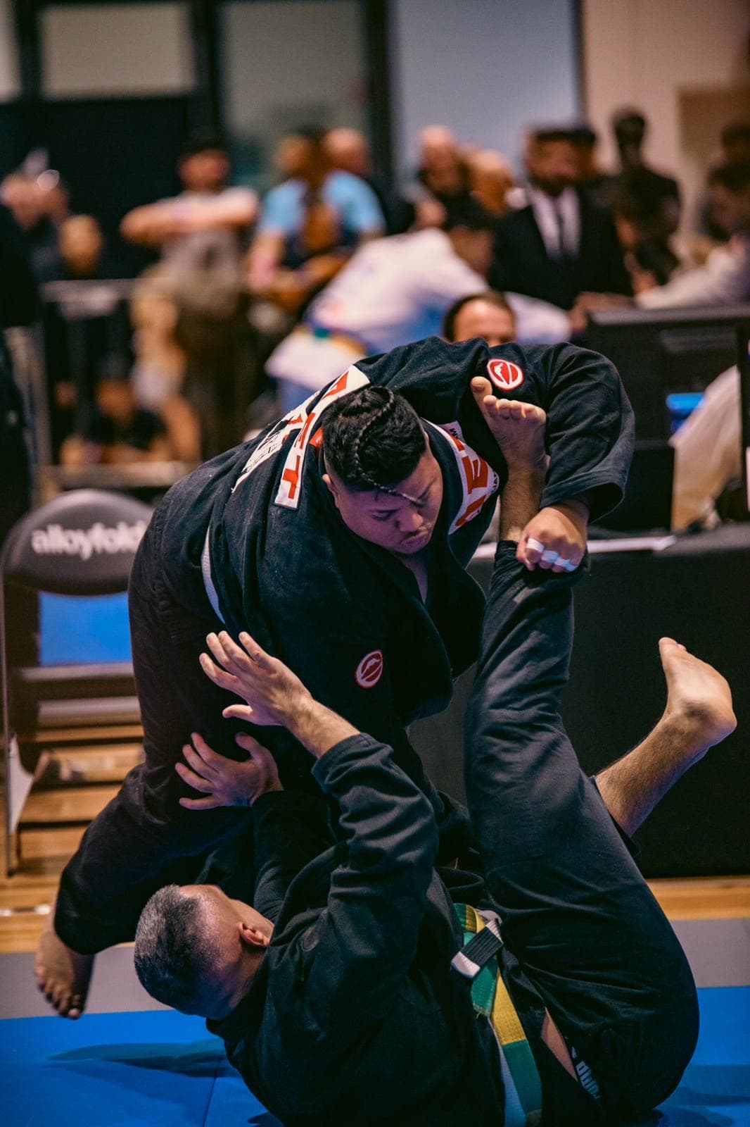 Rene competing in a jiu-jitsu match