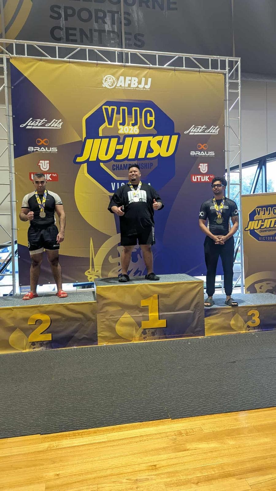 Rene on the first-place podium at the VJJC 2026 Jiu-Jitsu Championship